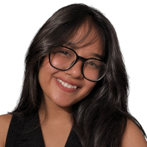 Kokil Tamta smiling, wearing glasses
